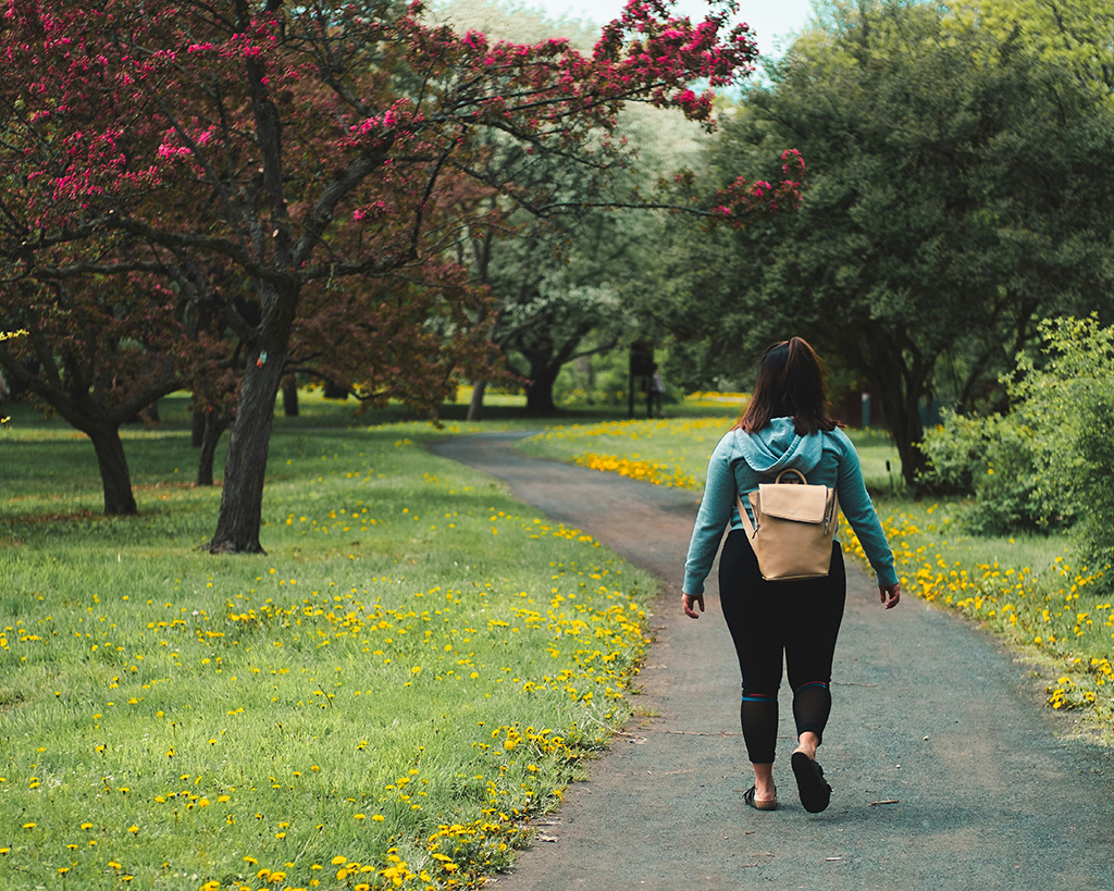 Woman walking in a park